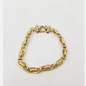 Beautiful vintage 7inch 14k gold bracelet with ruby cabochons adorned on clasp